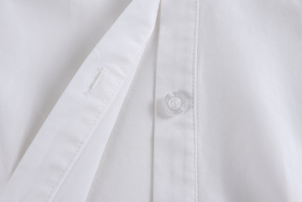 Chemise blanche plissée