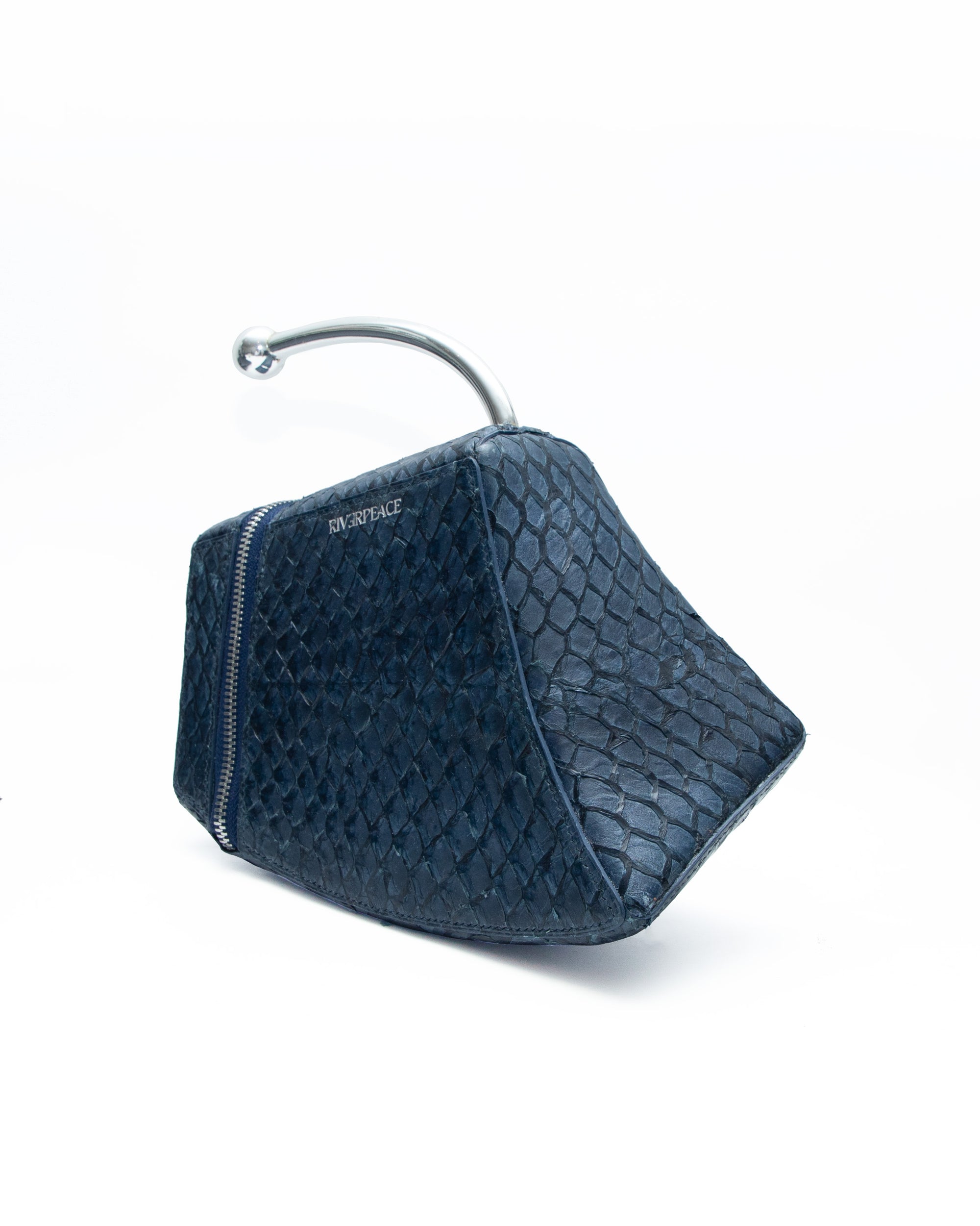 Blue textured handbag on a white background