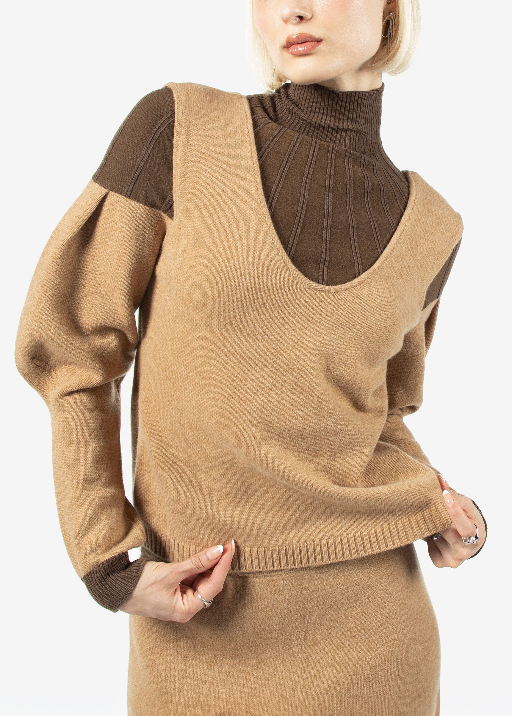Brown sweater dress with contrasting brown sleeves and neckline