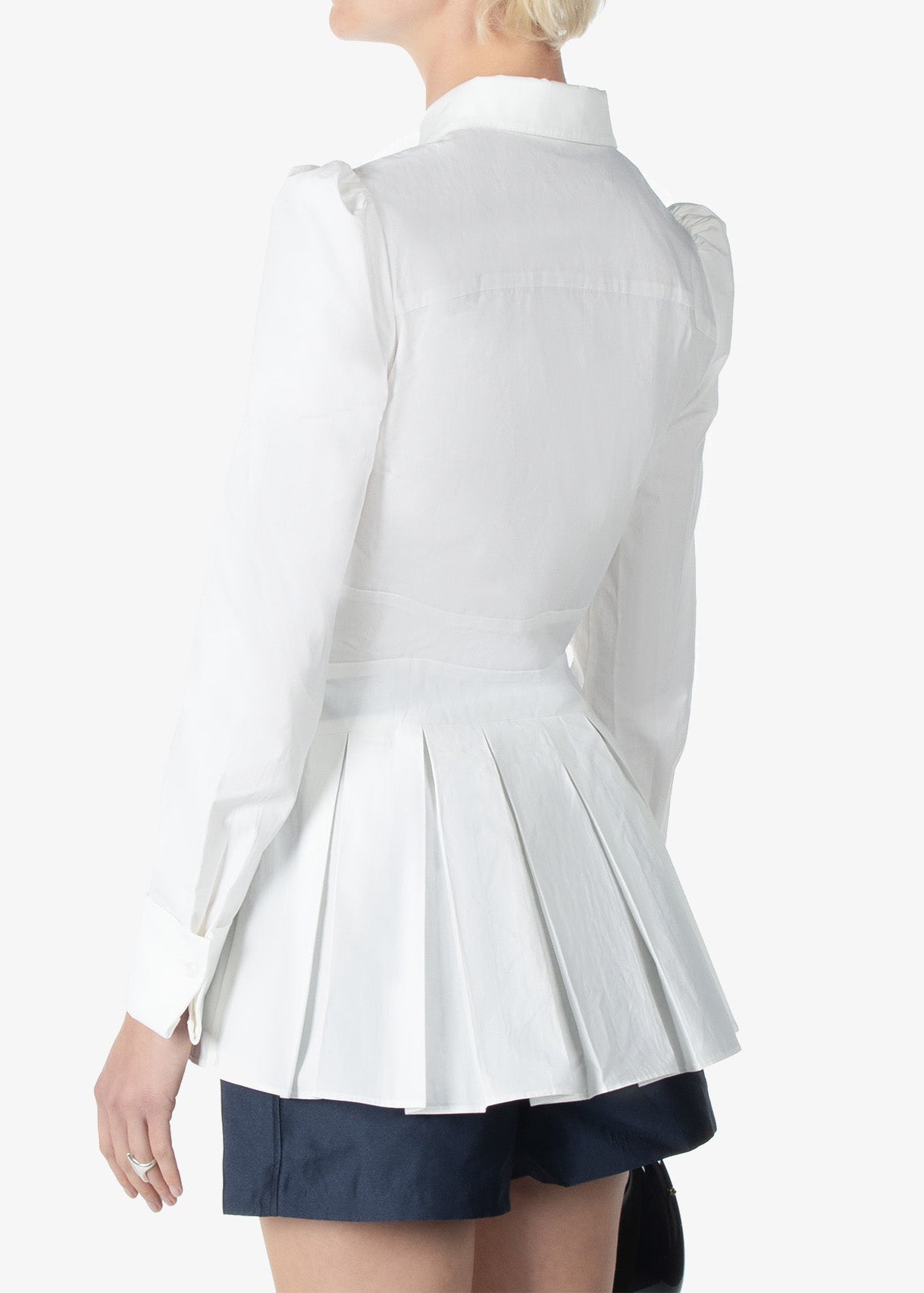 White pleated skirt with a fitted waistband